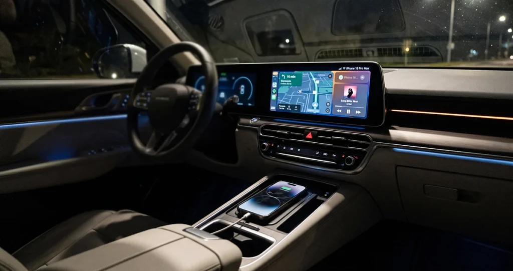 iPhone 18 Pro Max connected to a car infotainment system