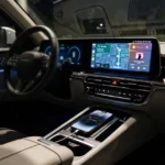 iPhone 18 Pro Max connected to a car infotainment system