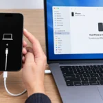 iPhone 18 Pro Max connected to a laptop while entering DFU mode