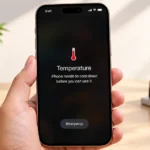 iPhone 18 Pro Max displaying a temperature warning screen indicating that the device needs to cool down before use.
